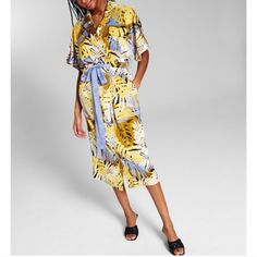 New With Tags Tropical Midi Dress With Tropical Print For Day Out, Knee-length Tropical Print Dress For Vacation, Tropical Midi Dress For Day Out, Spring Tropical Print Midi Dress, Spring Tropical Print Short Sleeve Midi Dress, Spring V-neck Dress With Palm Tree Print, Chic Yellow Printed Midi Dress, Casual Tropical Print Short Sleeve Midi Dress, Summer Lemon Print Midi Dress