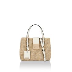 The Micro Mandy bag is a nautral raffia tote style bag. There are metallic gold, leather alternative trims and luggage style tag on the front. 19cm (H), 25cm (W), 11cm (D) Strap length: 123cm Strap drop: 59cm Flap over magnetic closure Interior central zipped pocket Outer: Textile Interior: Monogrammed interior lining Style number: 9904741449 Textile Interior, Day Bag, Gold Leather, Shoe Shop, Magnetic Closure, Metallic Gold, Mini Bag, Gold Metal, Zip Pockets