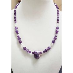 Amethyst faceted arrow gemstone choker necklace is made with 4mm amethyst gemstone spacer beads. 6mm amethyst gemstone spacer beads with silver flower spacer beads in between the 6mm gemstone beads. 3mm and 6mm briolette crystal glass spacer beads and 3mm silver round spacer beads. The necklace is 16inches long with a 1.5 extender chain to make the necklace longer if desired. 💜 Healing Amethyst Gemstone Beads Crystals, Adjustable Amethyst Jewelry With Polished Beads, Adjustable Amethyst Round Bead Gemstones, Amethyst Round Beads Gemstones For Healing, Amethyst Round Beads, Adjustable Amethyst Crystal Necklace Spiritual, Amethyst Gemstone Crystals With Round Beads, Healing Amethyst Gemstones In Round Beads, Adjustable Amethyst Crystal Necklace For Spiritual Use