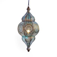 an intricately designed light fixture hanging from a ceiling