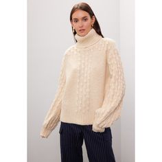 Off-white knit (66% Acrylic, 12% Polyester, 10% Nylon, 8% Wool, 4% Alpaca). Sweater. Long sleeves. Turtleneck. Pull on. 24" from shoulder to hemline. Imported. White Cable Knit Outerwear For Work, White Knitted Sweater For Work, Spring Chunky Knit Sweater For Workwear, Knitted Winter White Sweater For Fall, Cream Knit Sweater For Cold Weather, Winter White Knitted Sweater For Fall, Cream Wool Sweater For Fall, Spring Workwear Chunky Knit Sweater, Cream Sweater For Workwear In Winter