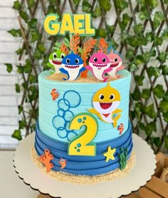 a birthday cake decorated with an ocean theme