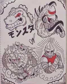 some japanese tattoos on a sheet of paper