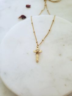 * Love this tiny cross necklace! Hand formed, hammered and wrapped cross gives a unique, authentic vibe. * Necklace is on pretty and dainty satellite chain, and finished with a secure lobster clasp. All components Sterling silver or Gold fill. ~Choose from~ *Sterling silver *14k gold fill *14k rose gold fill ♡ Gold fill does not tarnish/wear off/turn you green, and contains 100 times more gold than plated jewelry! This means it's great for gifts that you want to last, and great for summer since Dainty Crucifix Cross Necklace With Delicate Chain, 14k Gold Filled Cross Necklace, Hammered Cross Pendant Necklace For Gift, Hammered Cross Necklace For Gift, Silver Bar Bracelet, Tiny Cross Necklace, Cross Charm Necklace, Necklace Christian, Tiny Cross