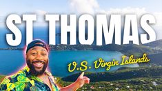 a man pointing at the camera with st thomas island in the background