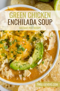 green chicken enchilada soup in a white bowl with tortilla chips