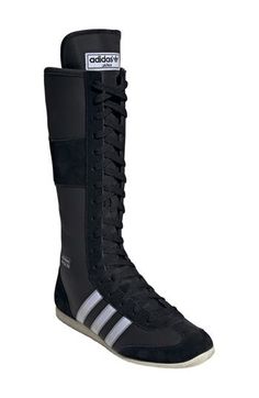 This sneaker pushes the boundaries of the expected, taking inspiration from the brand's archival Knockout boxing boot. Bringing undeniable drama to the boxing aesthetic, it has a suede-and-nylon upper with contrast 3-Stripes, all sitting on top of a low-profile rubber sole. Lace-up style Textile and leather upper/textile lining/rubber sole Imported Boxer Boots, Boxing Aesthetic, Boxing Boots, Up Styles, Cream White, Fashion Boots, Boxing, Low Profile, Boundaries