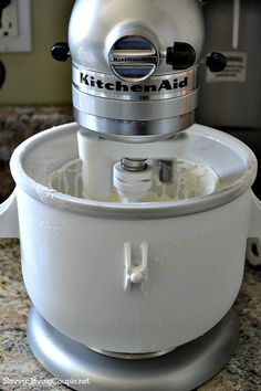 a kitchen aid mixer sitting on top of a counter