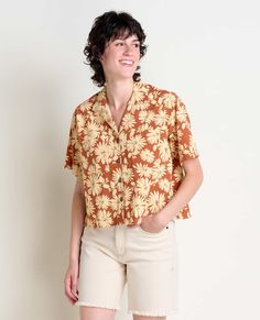 A top-notch travel shirt wears light, has great drape and a shape that looks good with whatever you pair it with, be it swimsuit or sweatpants. A suitcase superstar, at your service. Casual Brown Summer Blouse, Brown Summer Beach Shirt, Brown Summer Camp Shirt For Vacation, Brown Relaxed Fit Summer Shirt, Brown Relaxed Fit Shirt For Summer, Casual Rayon Camp Shirt For Vacation, Relaxed Fit Rayon Shirt For Beach, Relaxed Fit Rayon Shirt For The Beach, Versatile Rayon Tops For Vacation