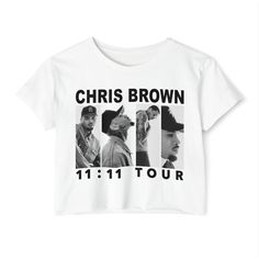 a white t - shirt with the words,'11 11 tour'printed on it