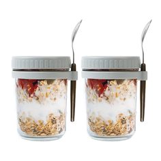 two glass jars filled with granola and yogurt on top of each other