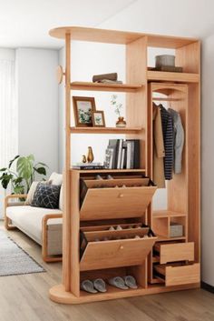 a living room with wooden furniture and white walls