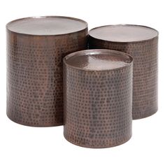 three metal canisters sitting next to each other