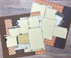 two scrapbook pages sitting next to each other on top of a wooden table with paper