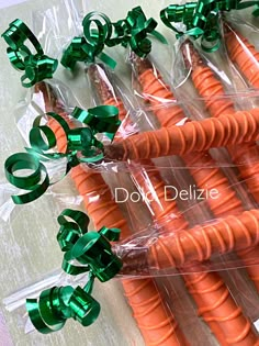 carrots wrapped in cellophane and tied with green bows