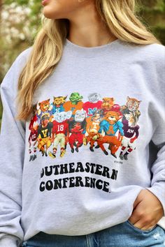 SEC Colorful Mascots Sweatshirt Aggie Football, Southeastern Conference, Football Uniforms, Comfy Sweater, Gray Sweatshirt, Comfy Sweaters, Sweater Weather, Black Print, To Miss