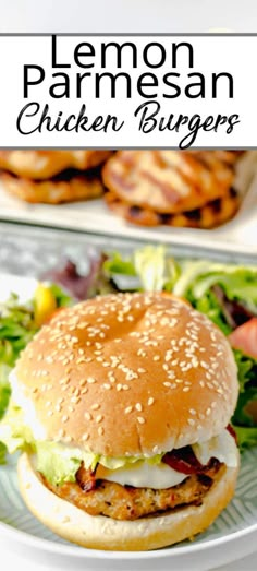 a chicken burger with lettuce and tomato on the side, served in a white plate