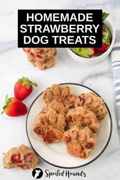 homemade strawberry dog treats on a white plate with strawberries and bowl of strawberries in the background