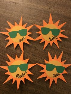 four sunbursts with sunglasses and name on them