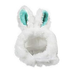 a white bunny hat with blue ears