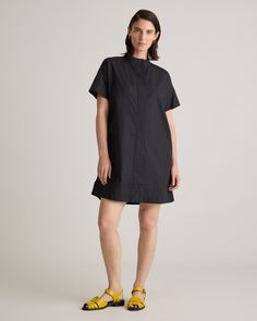 Our 100% Organic Cotton Short Sleeve Shirt Dress is designed for the modern woman who values both fashion and ease. Crafted from high-quality, organic cotton poplin, this dress is not only beautiful, but also environmentally friendly. The breathable fabric provides comfort and versatility, making it perfect for those warm, sunny days. Black Cotton Relaxed Fit Shirt Dress, Black Cotton Shirt Dress With Relaxed Fit, Black Relaxed Fit Cotton Shirt Dress, Chic Black Relaxed Fit Shirt Dress, Chic Black Shirt Dress With Relaxed Fit, Black Relaxed Fit Shirt Dress For Spring, Black Relaxed Fit Shirt Dress For Work, Black Cotton Shirt Dress For Spring, Black Cotton Shirt Dress For Summer