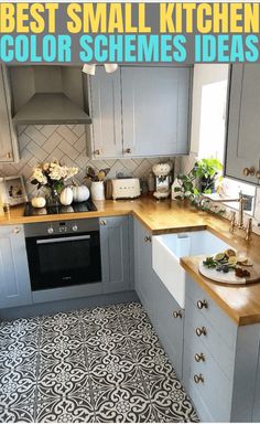 the kitchen is decorated in grey and white with wood countertops, tile flooring, and wooden counters