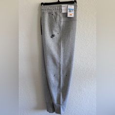 Nike Sportswear Tech Fleece Women's High-Rise Pants Size Available: M Color: Dark Grey Heather/Black Style: Cw4292-063 Brand New. No Damage Or Stains Standard Fit: Easy And Traditional Full Length: Hits Below Ankle Fits Large; Nike Recommend Ordering Your Usual Size For A Roomy Cut, And A Size Down For A More Tailored Fit Product Details Standard Fit For A Relaxed, Easy Feel Body: 69% Cotton/31% Polyester. Pocket Bags: 100% Cotton. If You Have Any Questions, I Will Be Happy To Answer You As Soon Nike Sportswear Tech Fleece, Tech Fleece, High Rise Pants, Pocket Bag, Black Style, Nike Pants, Heather Black, Nike Sportswear, Be Happy