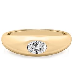 a yellow gold ring with a single diamond in the center and an oval shaped band