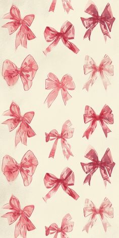 a bunch of red bows are on a white surface with watercolor paint over it