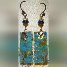 Beautiful Patina Painted Copper Earrings That Has Been Embossed Stamped And Has Abalone Beads And Czech Beads. Blue Pierced Copper Earrings, Blue Copper Pierced Earrings, Blue Artisan Copper Earrings, Artisan Blue Copper Earrings, Unique Blue Copper Earrings, Blue Rectangular Earrings With Ear Wire, Blue Rectangular Earrings, Bohemian Blue Copper Earrings, Artisan Blue Rectangular Jewelry