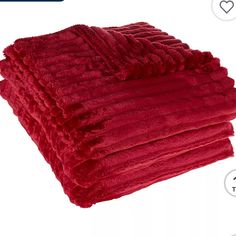 red towels stacked on top of each other