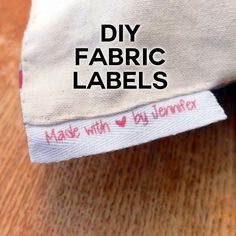 the fabric label is on top of an unmade piece of cloth that says diy fabric labels