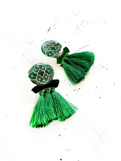 "AVISH Persian tassel earring is handcrafted and features a historic tile pattern from an old Persian architecture. This earring is the perfect Christmas / Valentine's day/ birthday gift for your friend, sister, mother, bridesmaid, loved one, or a special treat just for yourself . The round bezel is in antique bronze tone made of Copper (Cadmium Free). Bezel size: about 1\" in diameter. Ear wire is made of Alloy measuring 3/4\" and hangs down from ear approximately 2 3/4\" READY TO SHIP. While e Green Beaded Fringe Tassel Earrings Gift, Bohemian Metal Tassel Earrings For Pierced Ears, Bohemian Green Tassel Earrings With Fringe, Bohemian Nickel-free Tassel Earrings As Gift, Nickel-free Bohemian Enamel Earrings, Mandala Jewelry, Persian Architecture, Persian Motifs, Valentines Day Birthday