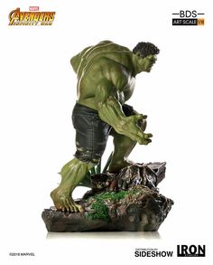 the hulk statue is displayed on a white background