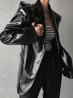 An oversized patent shiny leather blazer with classic slim cut fit. Great to dress up or down, over jeans or a dress. Model is in MINUSEY ONE SIZE. ✔️ Free worldwide express shipping over $100✔️ Loved by 6,500+ customers✔️ Limited edition collections, maximum style⠀⠀⠀⠀⠀⠀⠀⠀⠀Stay ahead of the trend with can’t-find-anywhere-else staples. Your closet will thank you 💕* MINUSEY ONE SIZE = EU 34-36, US 2-6* 100% PU Leather* Dry clean* Made in Korea - Model Height: 172cm/5'7" (US 2, EU 34) Sleek Black Leather Jacket For Party, Black Trendy Leather Jacket For Formal Occasions, Black Leather Jacket Trendy Formal Style, Trendy Black Leather Jacket For Formal Occasion, Trendy Leather Blazer For Party, Trendy Leather Party Blazer, Chic Shiny Outerwear For Fall, Trendy Black Formal Blazer, Modern Blazer For Night Out In Winter