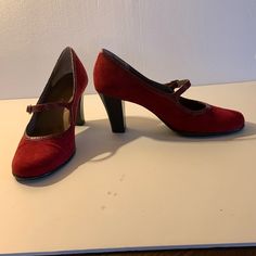 A Deep Red Suede Heel With Strap And Buckle Detail. 3 Inch Sturdy Heels, Nwot. These Shoes Were Never Worn. The Top Of The Shoebox Is Missing. Red Suede Heels With Almond Toe, Red Suede Low Heel Shoes, Red Suede Low Heel Heels, Red Suede Low Heels, Red Suede Heels, Black Leather Pumps, Gold Pumps, Aerosoles Shoes, Size 11 Heels