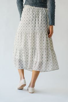 Get ready to twirl in style with the Antosh Tiered Patterned Midi Skirt! This cream-colored skirt features playful tiers and a unique pattern for a fun and quirky look. Perfect for adding personality to any outfit, this skirt will have you feeling confident and stylish. Details self/lining: 100% polyester Fabric Care Guide Here Sizing & Fit Measurements are approximate and taken while laying flat across the front. Not doubled. small: waist = 14"; length = 33" medium: waist = 15"; length = 33" la Patterned Midi Skirt, Piper And Scoot, Midi Skirt Pattern, Double J, Feeling Confident, Midi Length Skirts, Ribbed Cardigan, Small Waist, Skirt Outfits