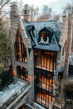 this is an aerial view of a gothic - style home in the suburbs of new york city