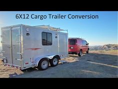 two trailers parked next to each other in the desert