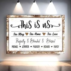 this is us sign hanging on the wall