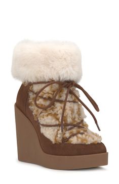 Faux fur adds an extra dash of cozy to this boosted wedge bootie detailed with laces and secured with a quick side zip closure. 4 1/4" heel; 1" platform Leather and textile faux-fur upper/synthetic lining/rubber sole Imported Fairies Wear Boots, Cute Shoes Heels, Dr Shoes, Wedge Bootie, Girly Shoes, Stil Inspiration, Jessica Simpson Shoes, Pretty Shoes, Wedge Boots