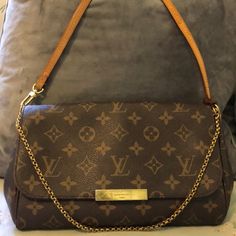 Wear On Strap And Vachetta Parts Of The Bag Scratches On Hardware Clear Are Shown In The Last 4 Pics Lv Crossbody Bag Louis Vuitton, Lv Vintage Crossbody Bag, Favorite Mm, Louis Vuitton Multi Pochette Brown Strap, Louis Vuitton Shoulder Bag Vintage, Louis Vuitton 2000s Bag, Lv Bags, The Bag, Louis Vuitton Bags