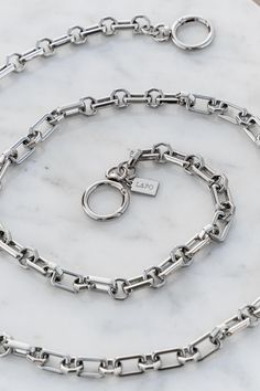 With a striking marriage of rectangular and circular links, Himalia has many sides to admire. This design looks stunningly different from every angle. The chain is completely adjustable and can be hooked at any point of the belt to achieve the perfect fit. Style it over a dress, pair it with trousers, or cinch the waist of a blazer for a sophisticated look. It can also be used as a bag chain. Silver Chain Belt, Felt Pouch, Chain Belts, Bag Chain, Waist Chain, Belt Accessories, Chain Belt, Fit Style, A Bag