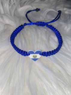 **Handmade in El Salvador    **Cord 1mm **Adult size 15cm braided but adjust to more  **Items available and ready for shipment ** order includes one bracelet El Salvador Bracelets, Blue Adjustable Heart Bracelet For Gift, Adjustable Blue Heart Bracelet For Friendship, Heart-shaped Adjustable Cord Jewelry, Adjustable Friendship Bracelets With Heart Beads, Adjustable Handmade Blue Heart Bracelet, Casual Adjustable Jewelry With Heart Charm, Adjustable Heart-shaped Friendship Bracelets With Heart Beads, Adjustable Heart-shaped Bracelet With Cord