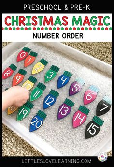 a christmas magic number order game in a tray with the title preschool and prek christmas magic