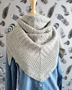 a woman wearing a gray knitted shawl and denim shirt with the words virginia by plucky knitter on it