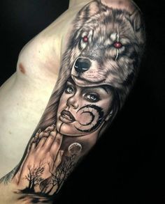 a woman with a wolf tattoo on her arm and chest is shown in black and grey