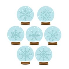 snow globes with snowflakes on them are arranged in the shape of balls