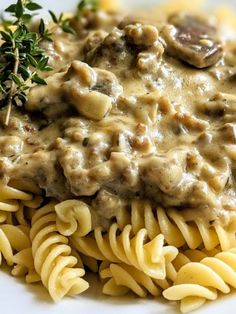 pasta with mushroom gravy served on white plate