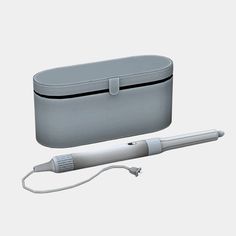 an electric toothbrush and case on a white background with clippings to the side